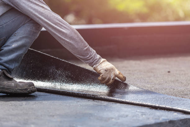 Professional Basement Waterproofing technician working in Belmore, OH